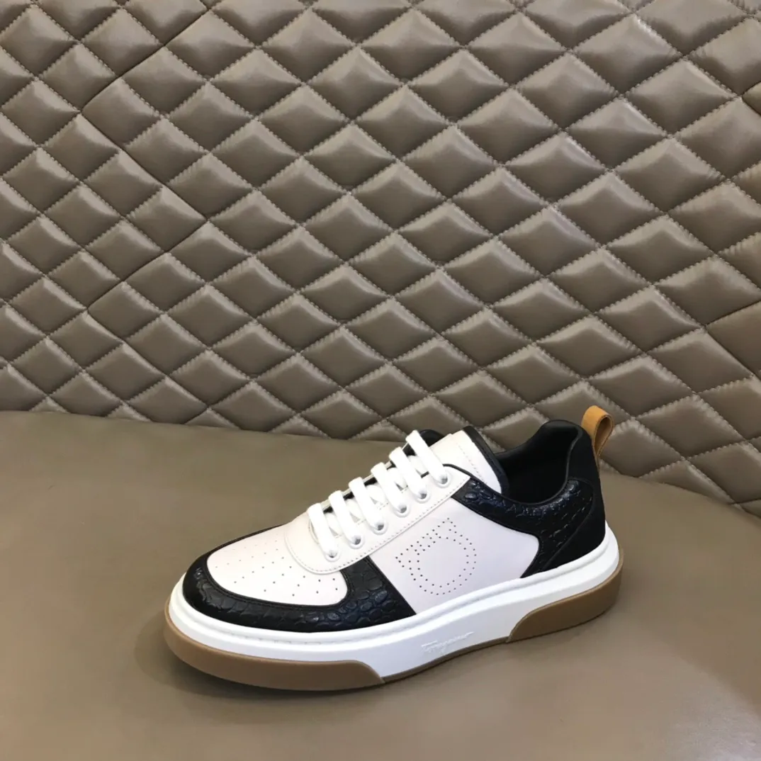 p420 "Salvatore Ferraga**" men's low-cut fashion sneakers. This casual shoe has a novel structure and is made of soft calfskin. The contrasting color elements on the upper highlight the bold and avant-garde atmosphere. The first-layer cowhide lining is high-end and comfortable. Energetic and fresh, these shoes can be worn with casual looks or add a touch of street style to elegant trousers.  Size: 38-44